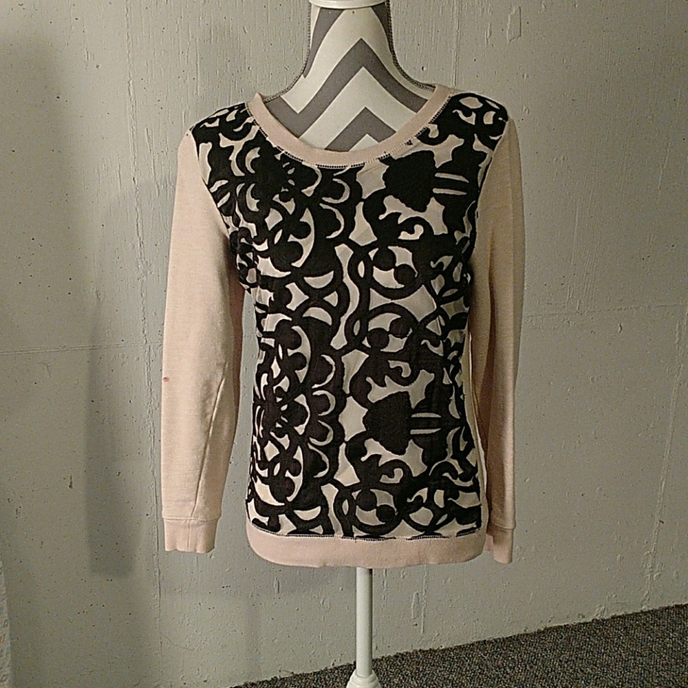 Black and tan sweater.